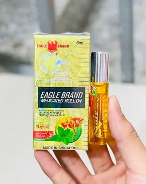 Dầu gió Singapore Eagle Refresh màu vàng 12ml (chai lăn)